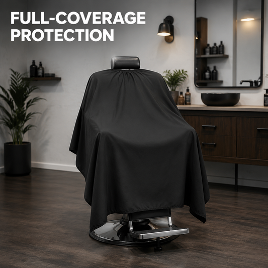 MV black barber cape on a salon chair with full-coverage protection text