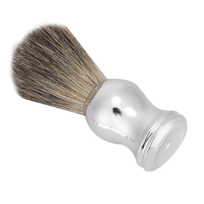 Silver-tone shaving brush shown on its side with dense bristles