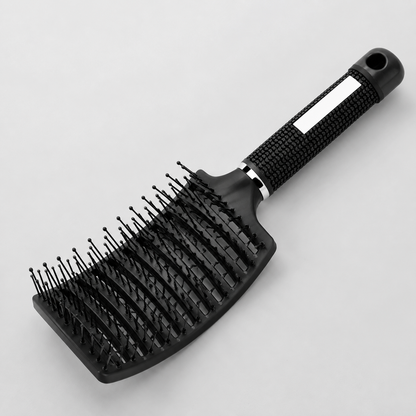 MV paddle brush vents, ball-tip pins and textured handle close-up