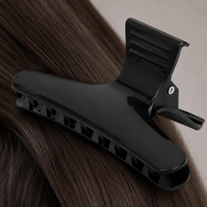 Close detail of wide black hair clip jaw, grip teeth and lever