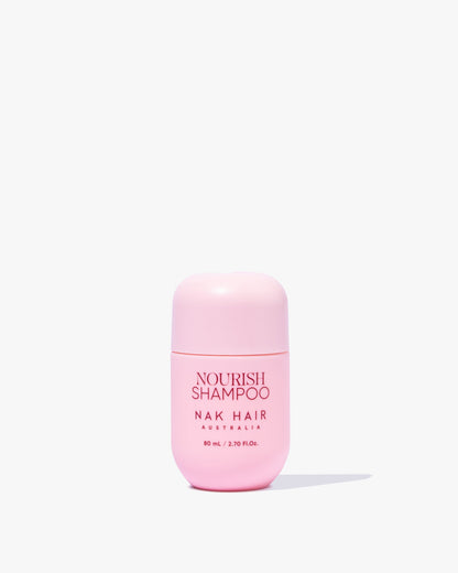 NAK Nourish Shampoo 80mL travel-size official product photo — component of Signature Nourish Travel Trio 2026 (XNTRAV26)