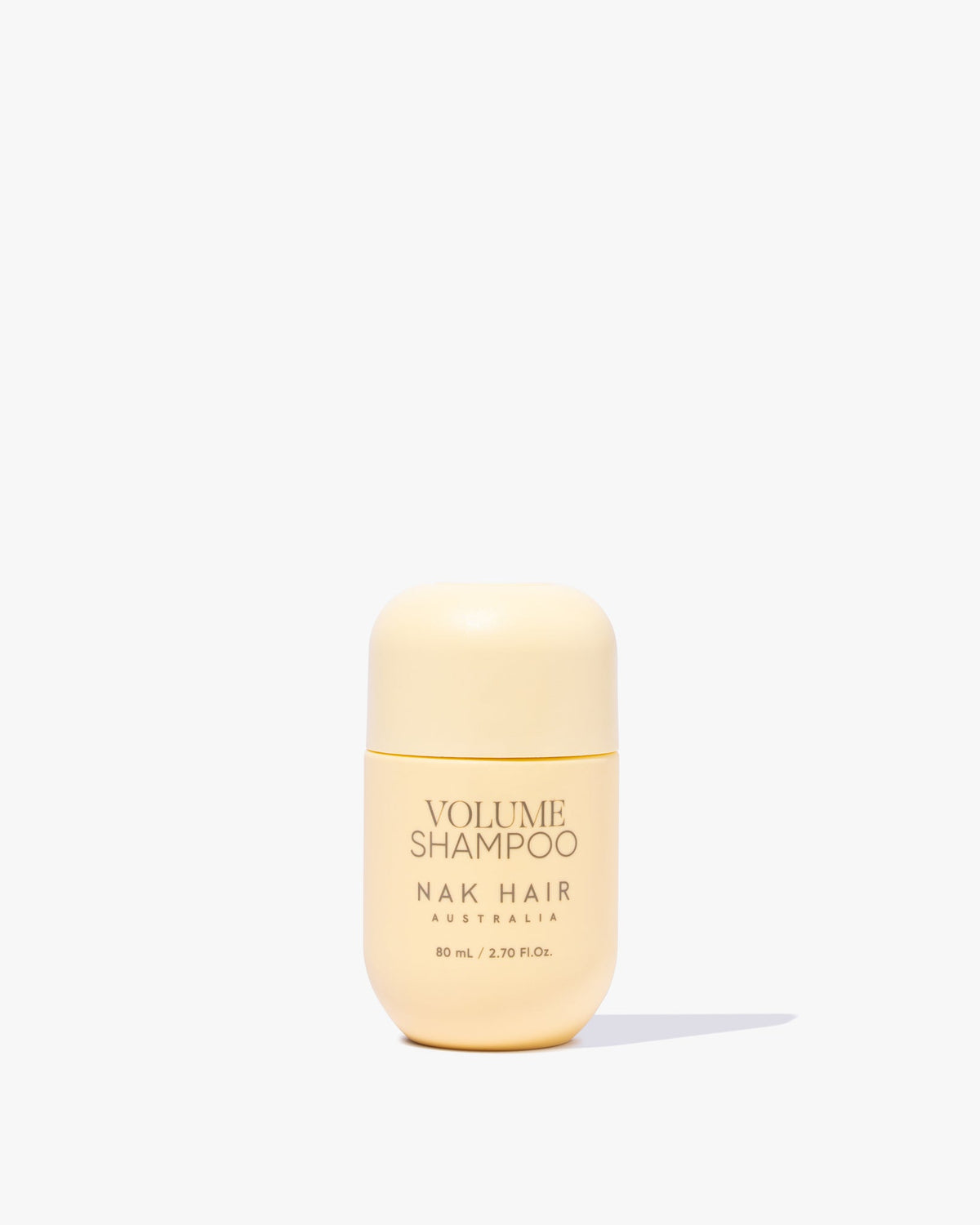 NAK Volume Shampoo 80mL travel-size official product photo — component of Signature Volume Travel Trio 2026 (XVTRAV26)