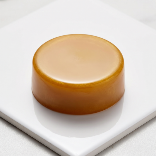 Natural Look Solid Gold amber depilatory wax puck close detail