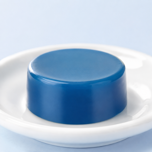 Natural Look Azulene Pearl blue hot-wax puck on a white dish