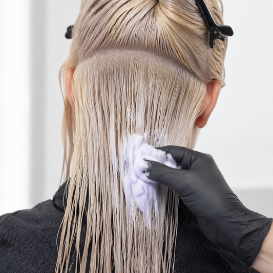 Natural Look Ice Blonde Toning Mousse applied through towel-dried blonde hair