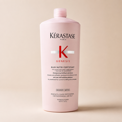 Kérastase Genesis Bain Nutri-Fortifiant 1000ml bottle on a beige background