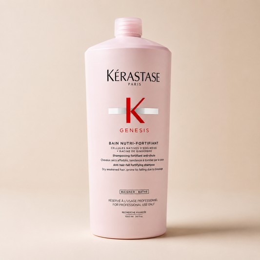 Kérastase Genesis Bain Nutri-Fortifiant 1000ml bottle on a beige background