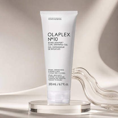 Olaplex No.10 Bond Shaper Curl Defining Gel 200ml on a clear studio plinth