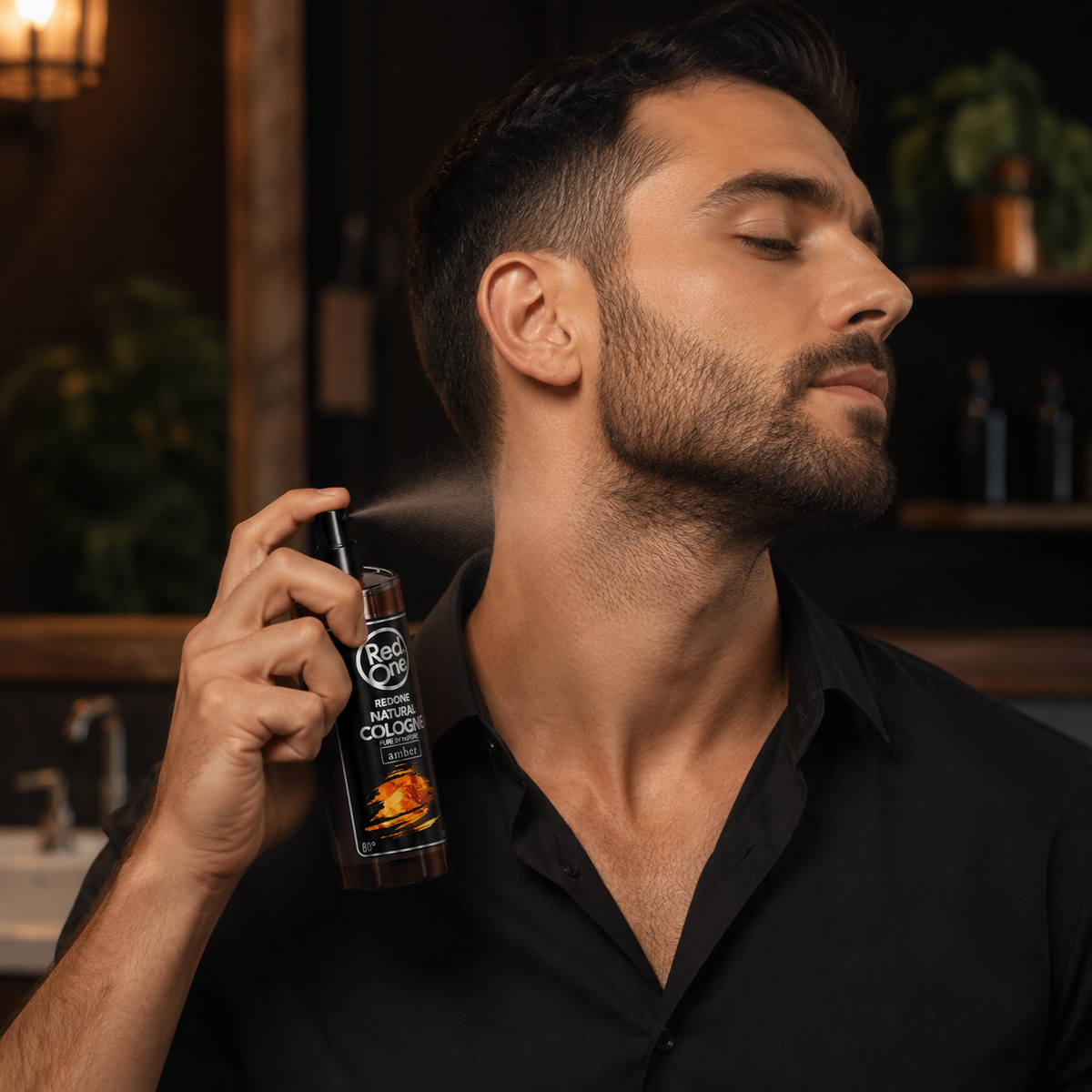 Man applying RedOne Natural Cologne Amber 150ml to his neck after shaving
