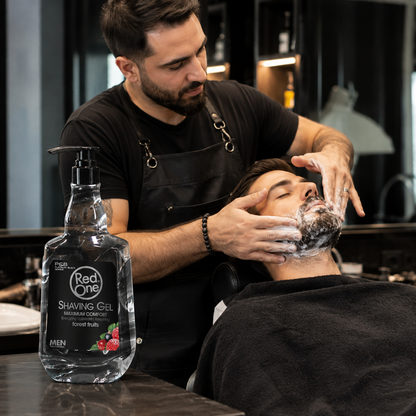 Barber applying RedOne Fruits Shaving Gel from the 1000ml tall pump bottle