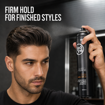 Adult model applying RedOne Ultra Hold Hair Styling Spray to styled hair