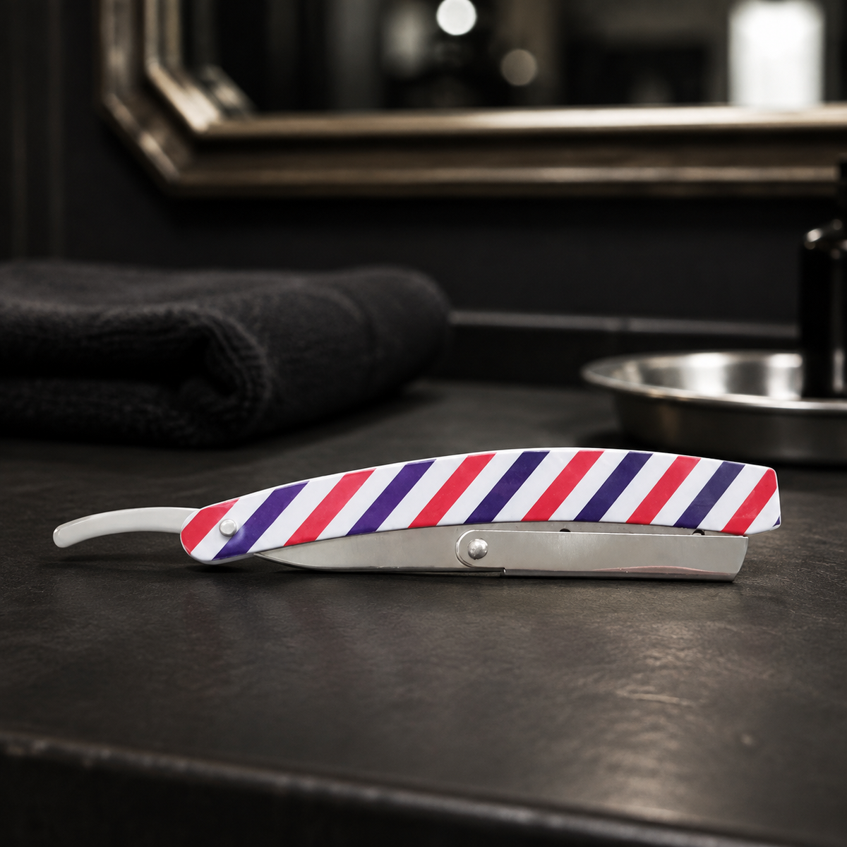 RedOne Razor Cap Barber Pole safely folded on a barber workstation