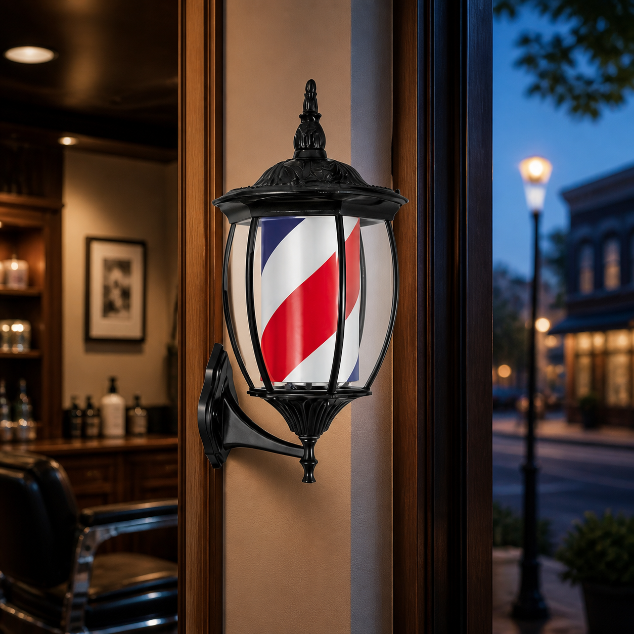 Vintage Black Rotating Barber Pole – Red, White & Blue 49cm displayed at a barbershop at dusk