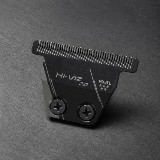 Wahl Hi-Viz 2.0 replacement T-blade on a charcoal barber-station surface
