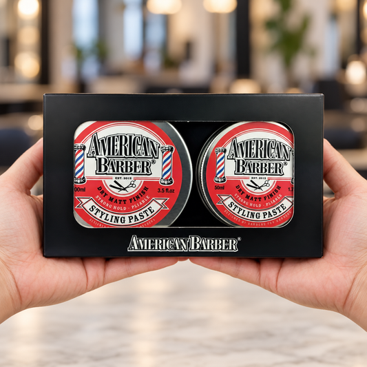 American Barber Styling Paste 100ml and 50ml duo pack held with both tins visible.