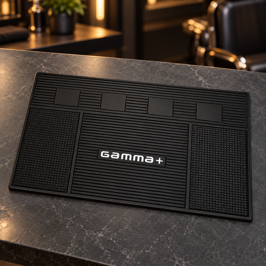Gamma+ Magnetic Rubber Barber Mat on a charcoal barber counter.