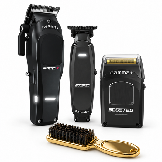 Gamma+ Boosted four-piece barber bundle with Boosted Up clipper, black Boosted trimmer, Boosted foil shaver and gold fade brush on a white background