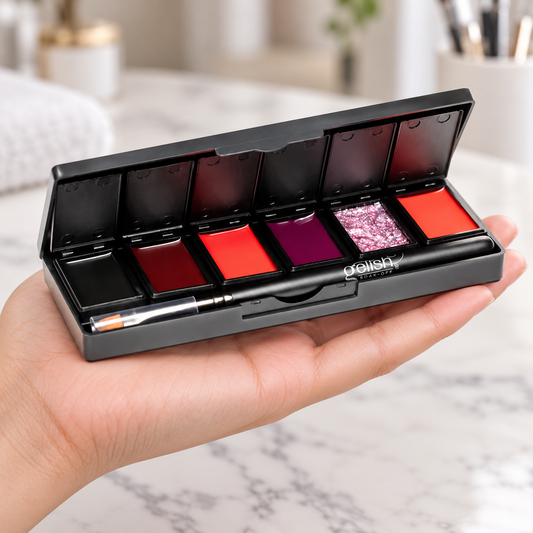 Open Gelish Getting Reddy six-colour cream gel palette with its brush, supported in a hand.