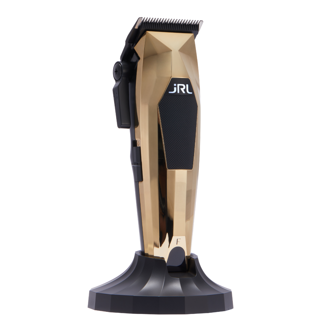 Included JRL 3000C Gold Limited Edition clipper and charging dock, angled view