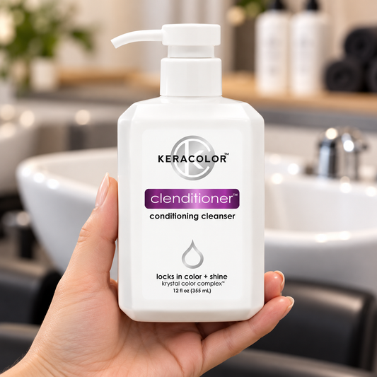Keracolor Clenditioner Conditioning Cleanser 355ml held upright in a salon, with the front label visible.
