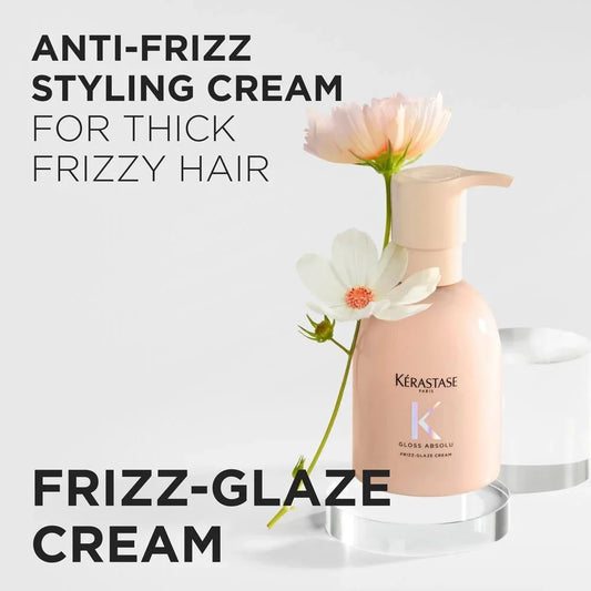Kérastase Gloss Absolu Frizz-Glaze Cream: anti-frizz styling cream for thick, frizzy hair, shown with flowers
