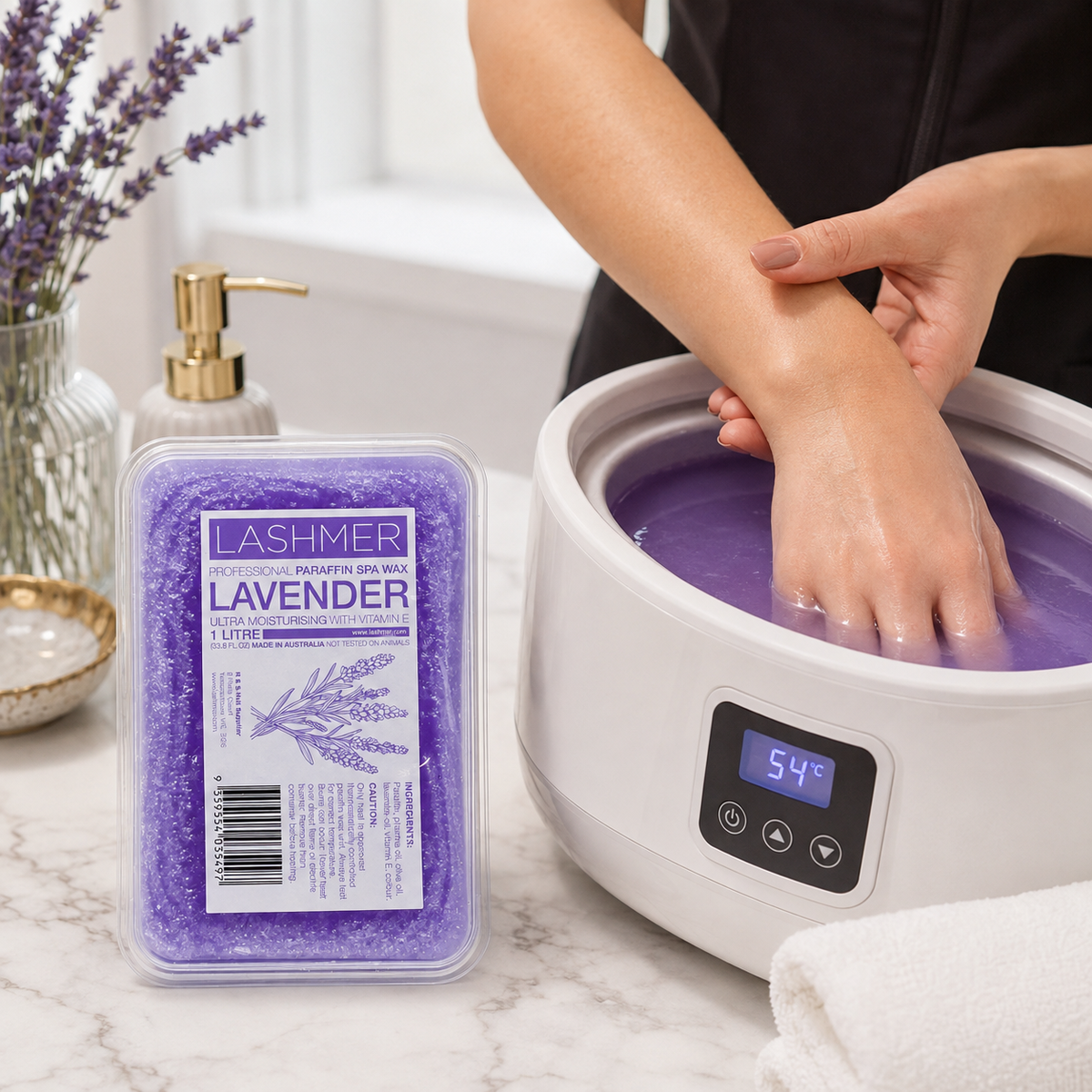 Lashmer Lavender Paraffin Wax used in a professional warming hand treatment