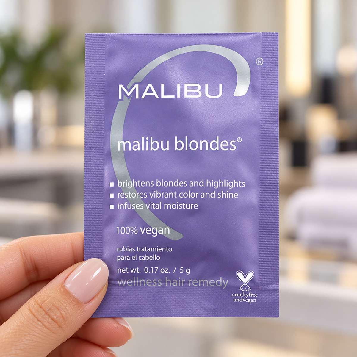 Malibu C Malibu Blondes Wellness Remedy 5g sealed sachet held with its front label visible