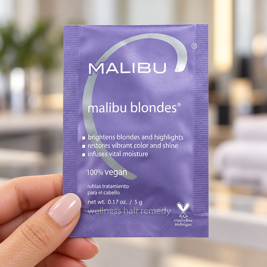 Malibu C Malibu Blondes Wellness Remedy 5g sealed sachet held with its front label visible