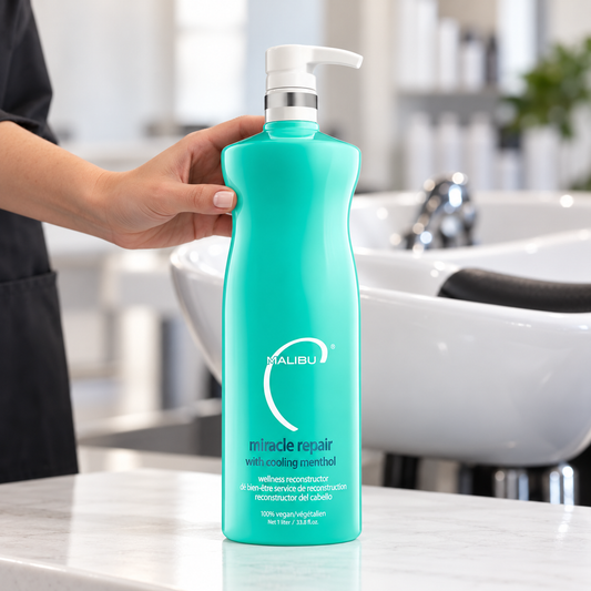 Malibu C Miracle Repair with Cooling Menthol 1 litre pump bottle beside a salon basin.