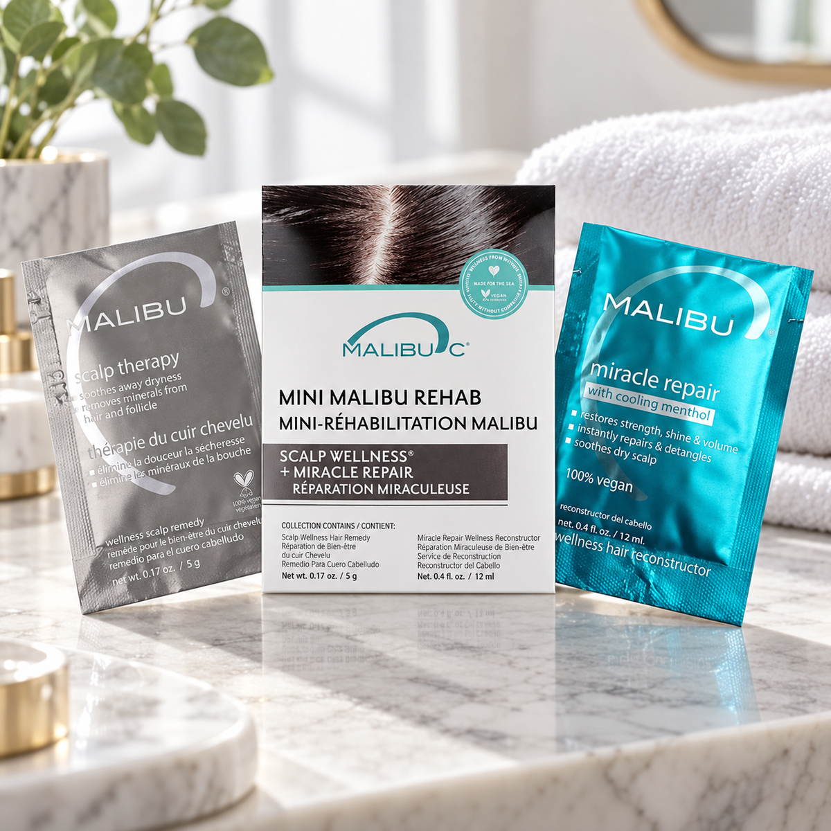 Malibu C Scalp Wellness Rehab Mini two-sachet kit on a clean salon vanity.