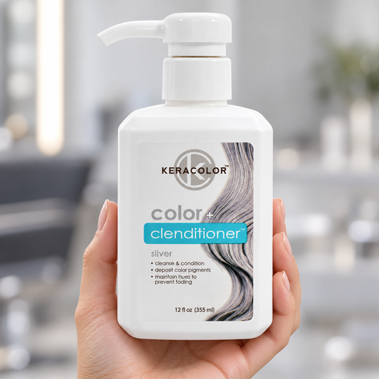Keracolor Silver Color Clenditioner 355 ml bottle held in a salon with its front label unobstructed.