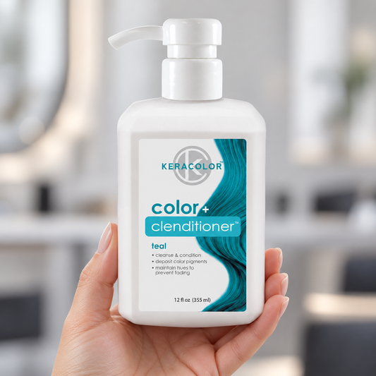 Keracolor Teal Color Clenditioner 355 ml bottle held upright against a softly blurred salon background.