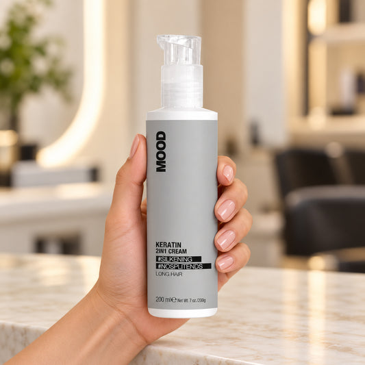 MOOD Keratin 2-in-1 Cream 200ml held upright at a salon workstation