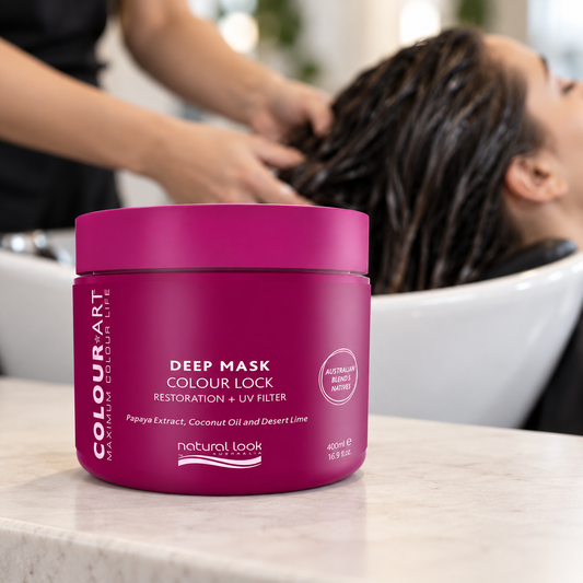 Natural Look ColourArt Deep Mask 400ml beside a salon basin while treatment is distributed through wet hair