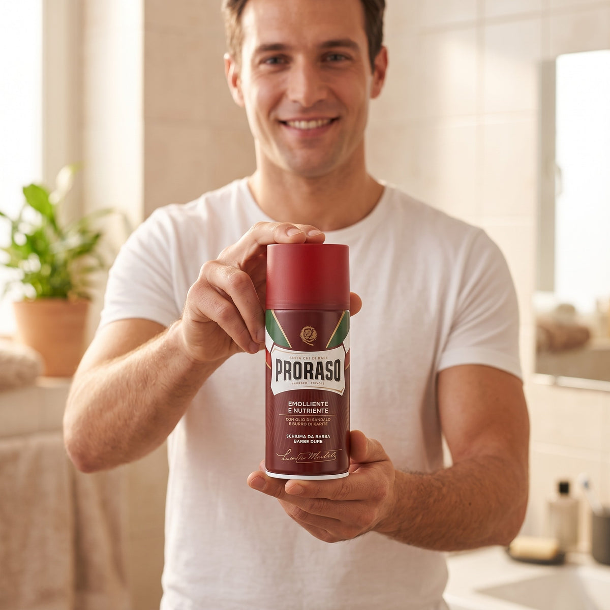 Man holding a can of Proraso Shaving Foam Coarse Beard 300ml