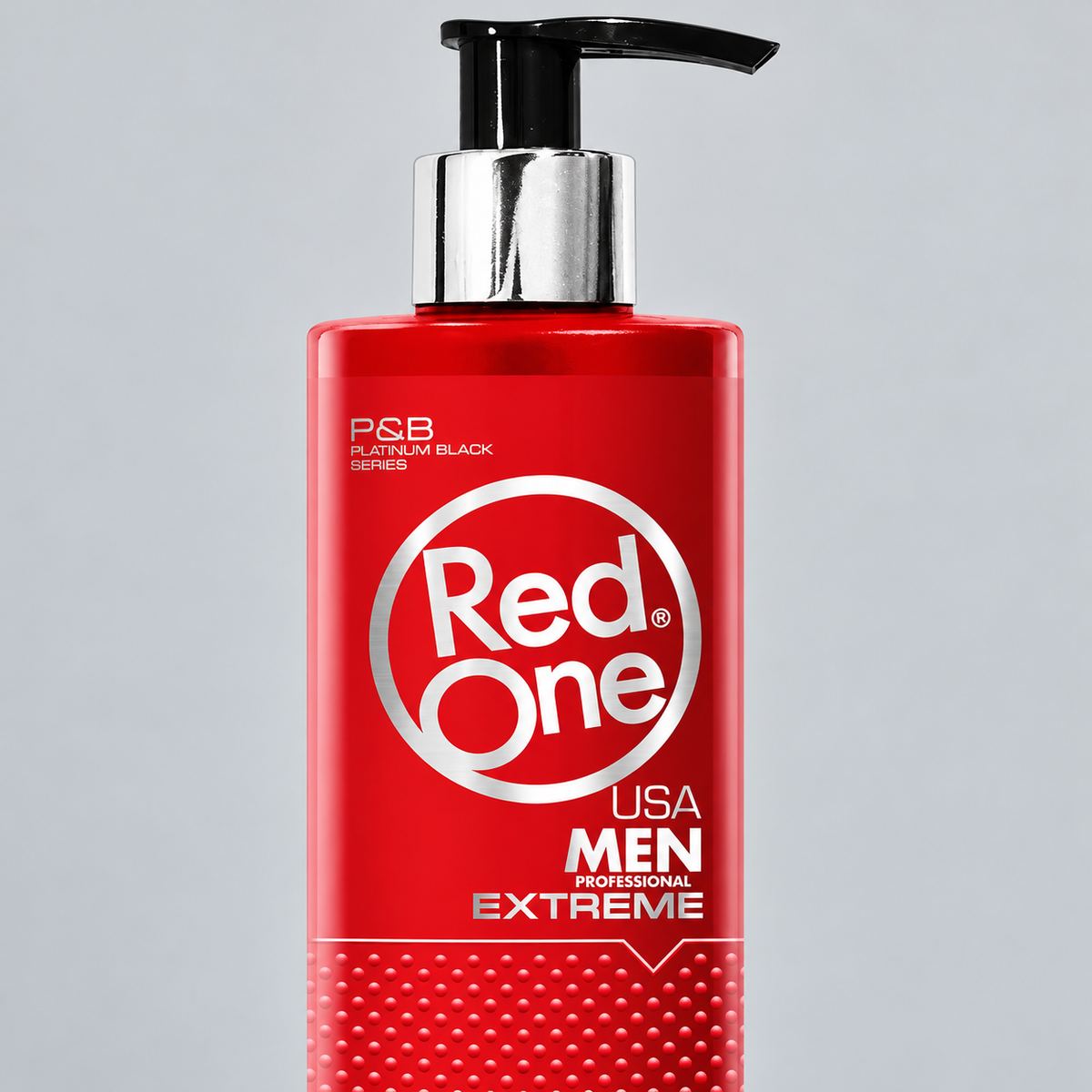 Close-up of the black pump, chrome collar and upper label on RedOne Extreme After Shave Cream Cologne 400ml.