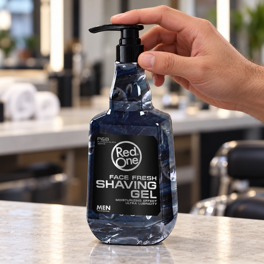 RedOne Face Fresh Shaving Gel 1000ml with a hand resting on its pump at a barber station.