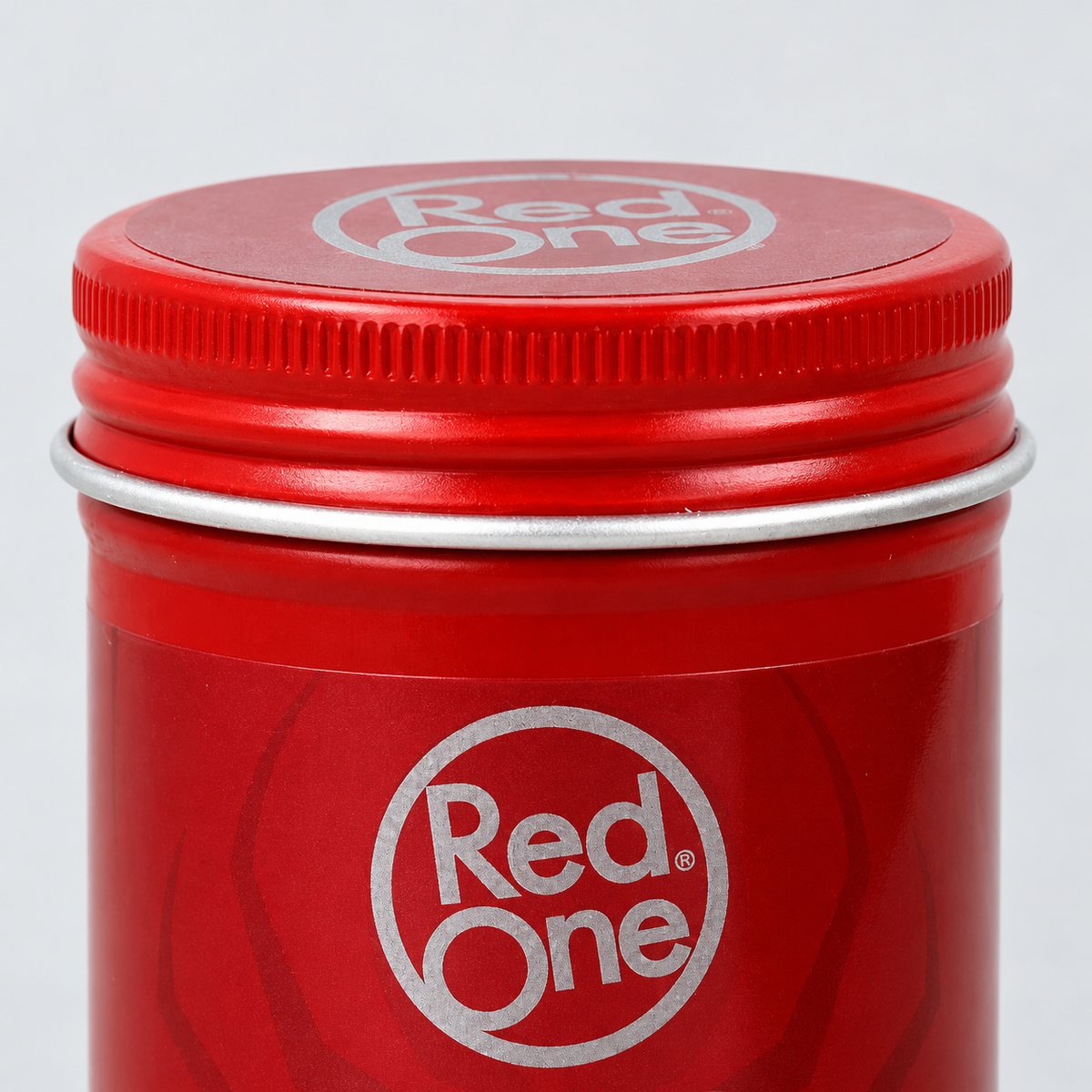 Close-up of the ribbed screw lid and metal rim on RedOne Spider Hair Wax Passionate 100ml.